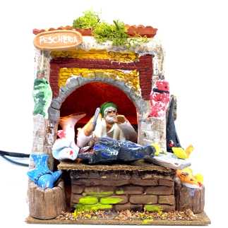 Pescheria con luce e pescivendolo in movimento 10/11 cm  17x17x21 cm