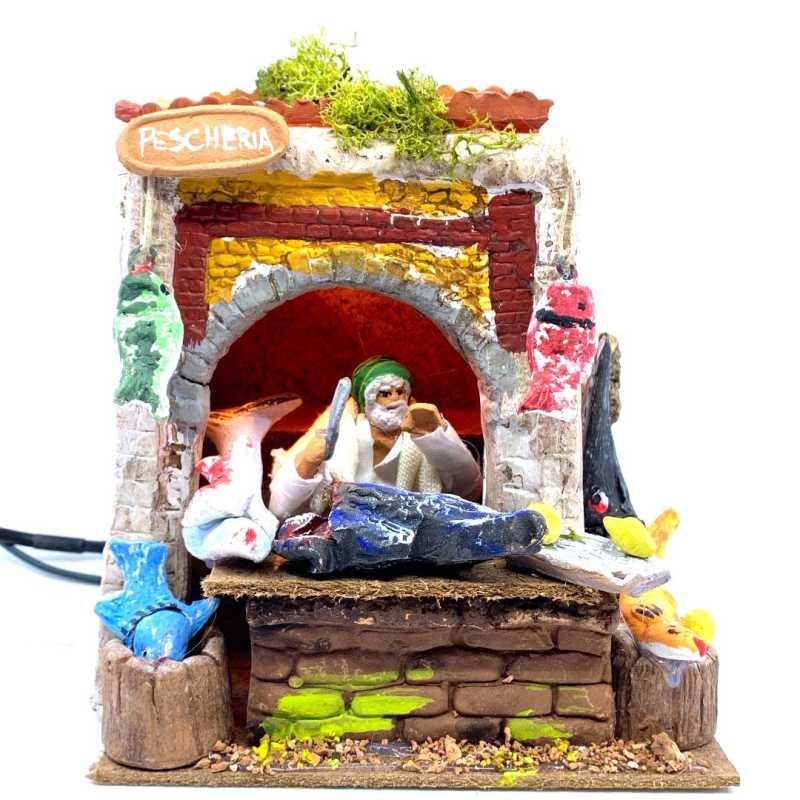 Pescheria con luce e pescivendolo in movimento 10/11 cm 17x17x21 cm Pescheria con luce e pescivendolo in movimento 10/11 cm 17x17x21 cm